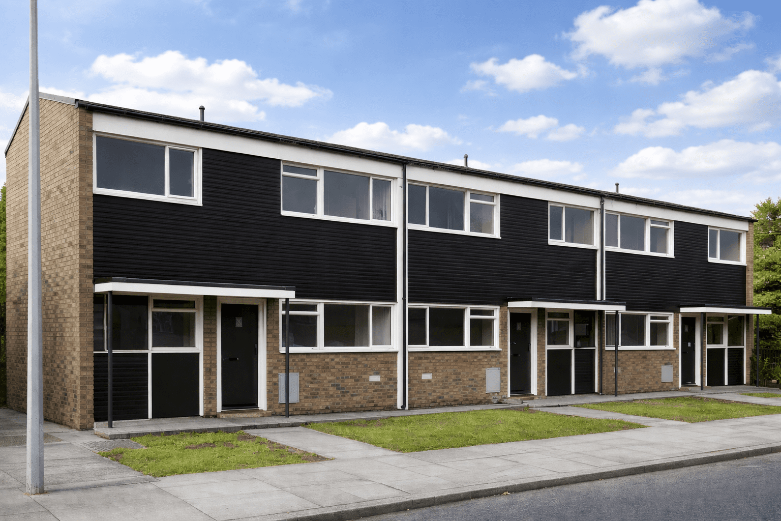 Unit System 67 house showing gable roof and mixed external wall cladding