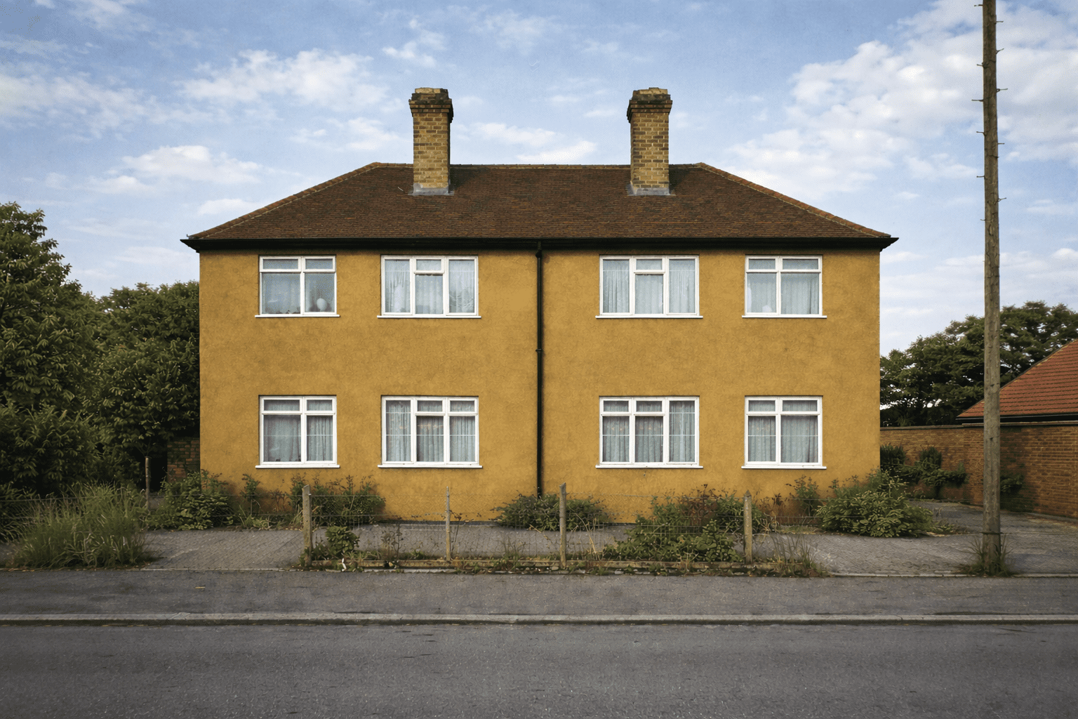 Bur-Pal house with rendered external walls and hipped roof
