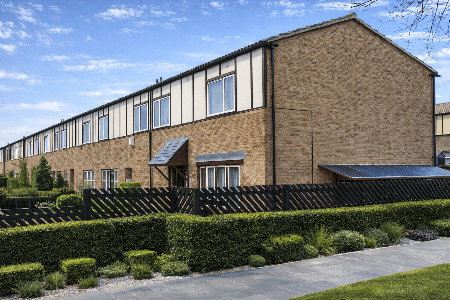 Mowlem house showing shallow pitch roof and rendered external walls typical of no-fines construction
